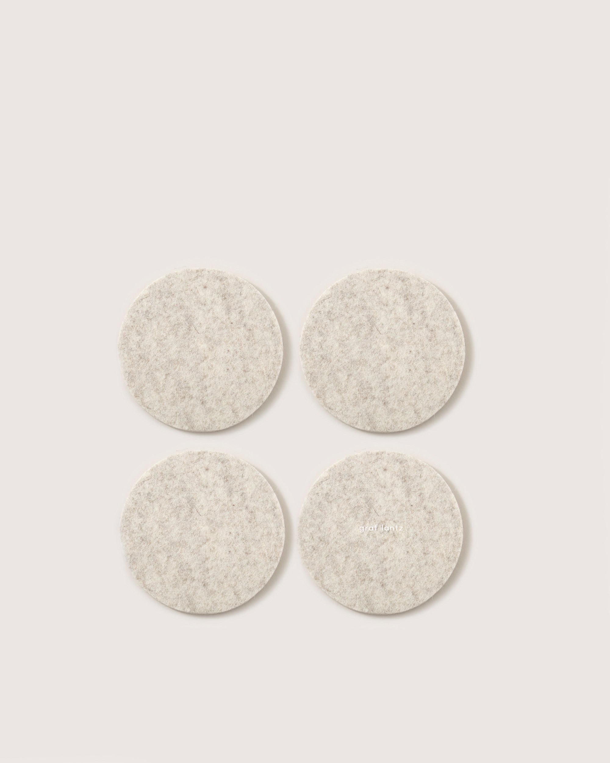 Kobon Leather/Merino Wool Round Tray 4 Pack Coaster Set