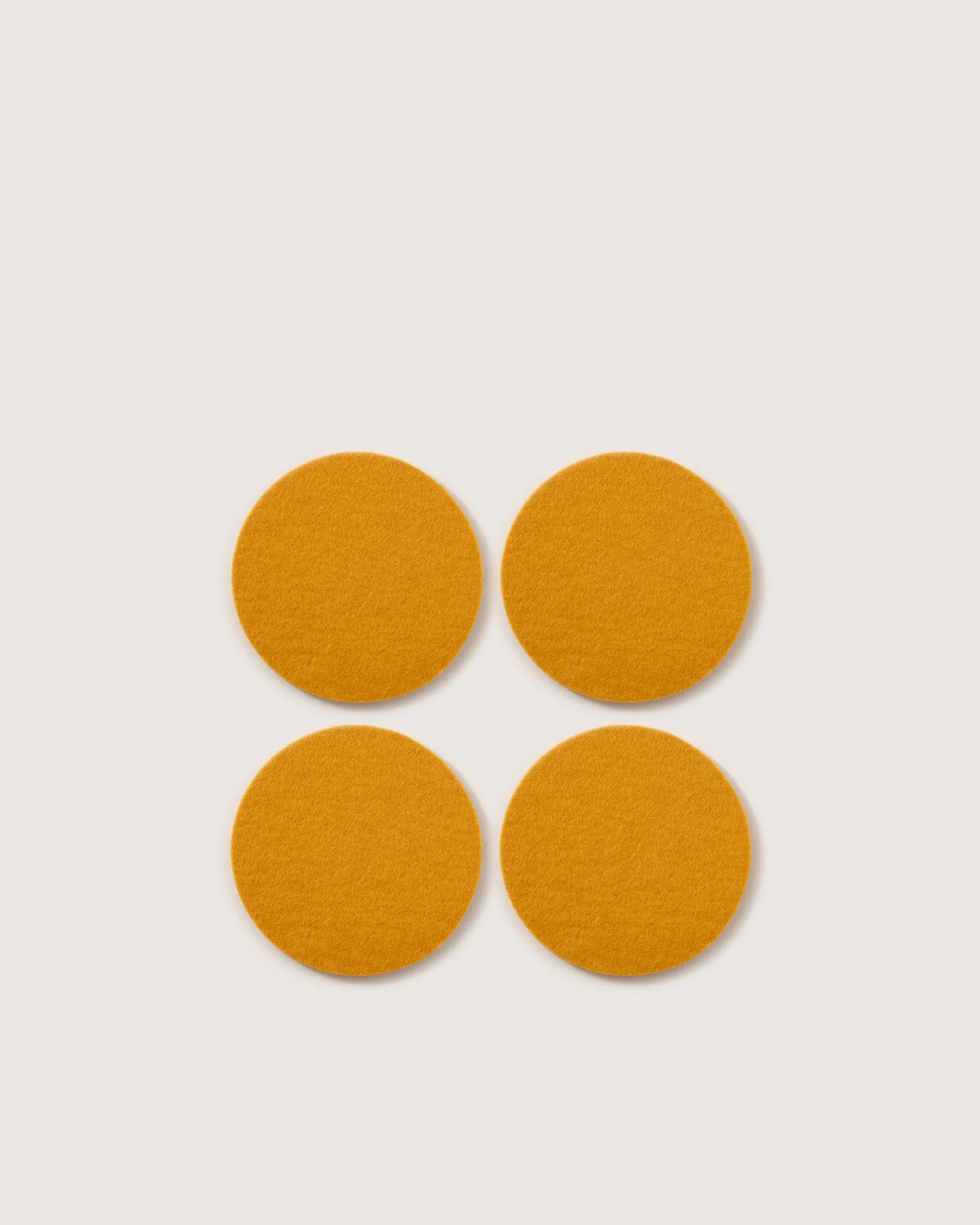 Kobon Leather/Merino Wool Round Tray 4 Pack Coaster Set