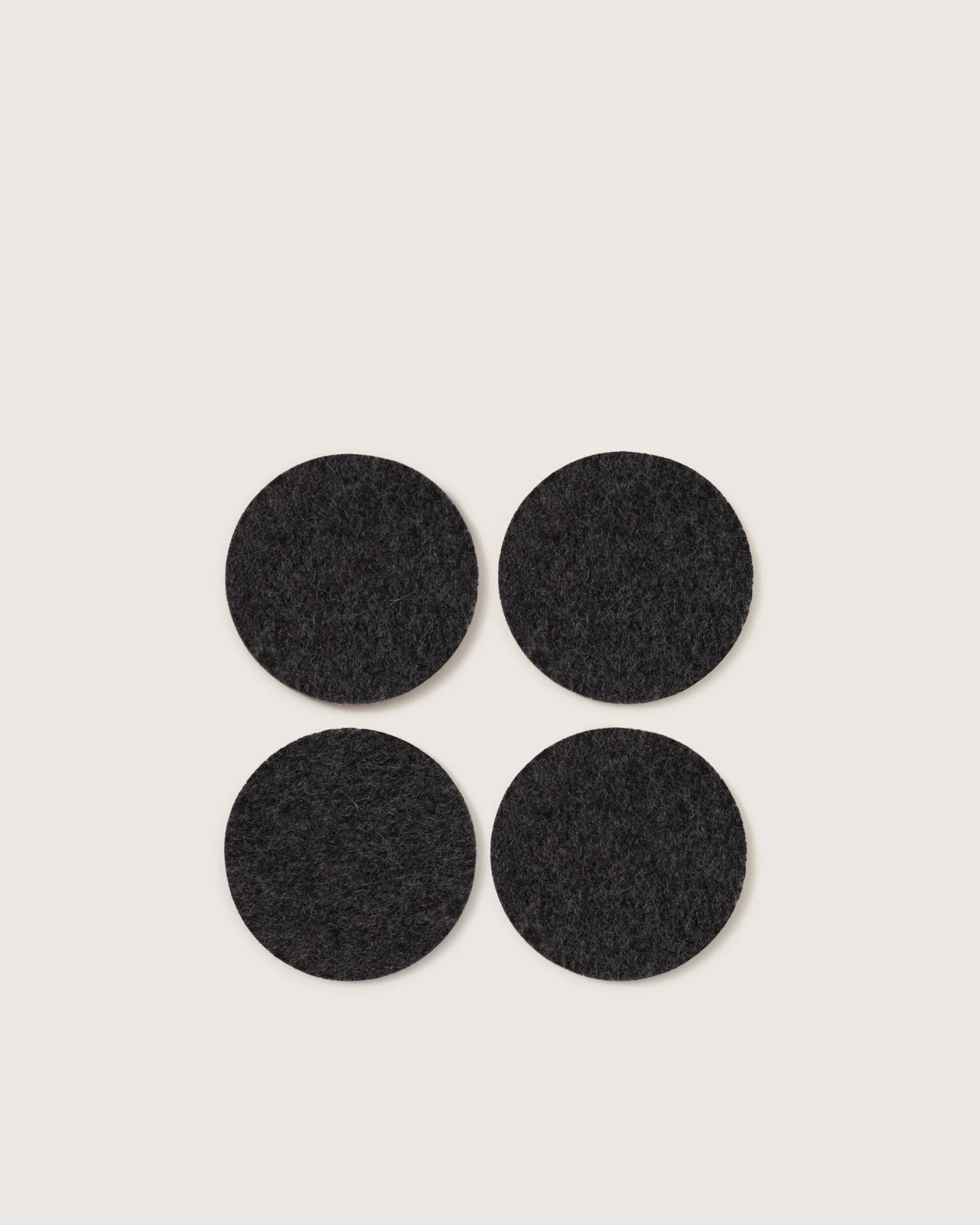 Kobon Leather/Merino Wool Round Tray 4 Pack Coaster Set