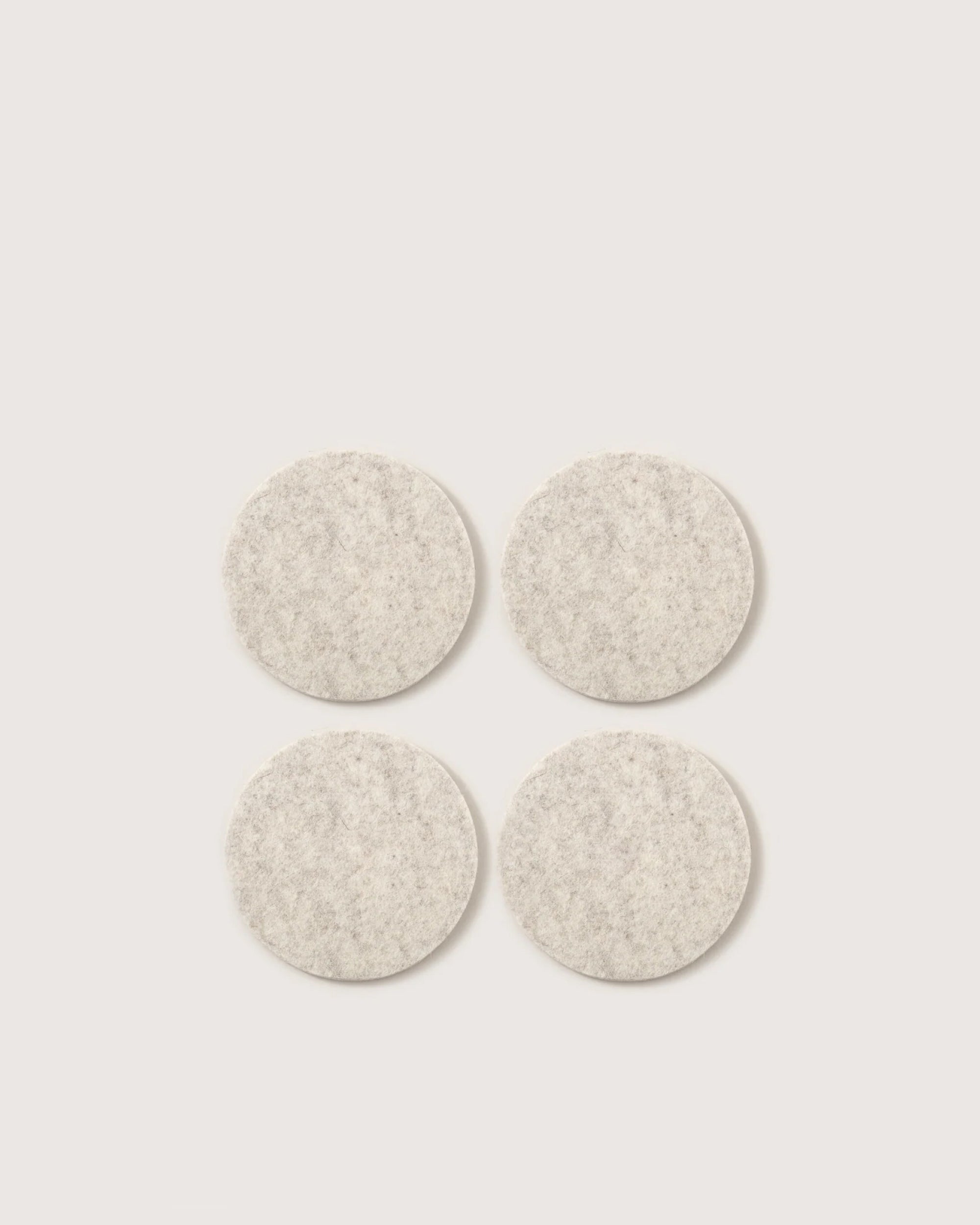 Kobon Leather/Merino Wool Round Tray 4 Pack Coaster Set