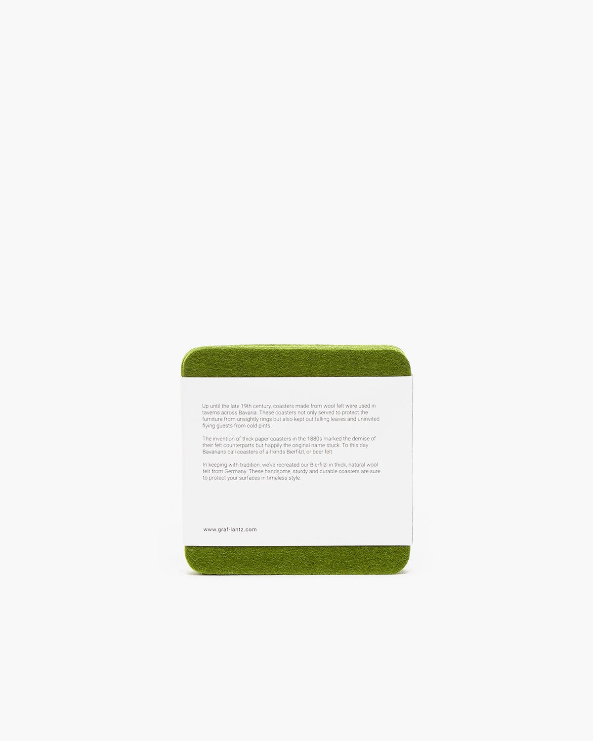 A graf lantz green square coaster with rounded edges lies against a white background, resembling Beer Felt. It features text about ceramic coaster history, though its illegible. A website URL is visible at the bottom.